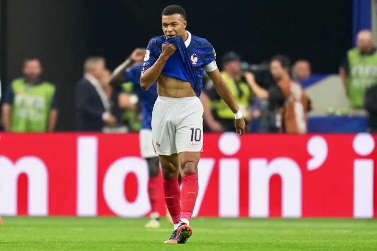 Spain shuts down Mbappé, France